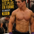 Un groupe d'athlètes CrossFit montrant leur force et détermination lors d'une compétition.